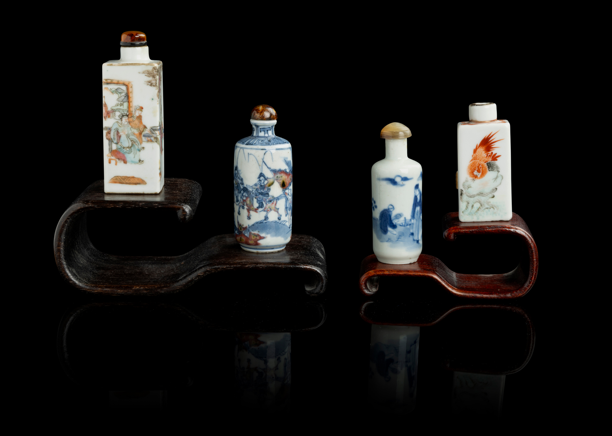 GROUP OF FOUR PORCELAIN SNUFF BOTTLES