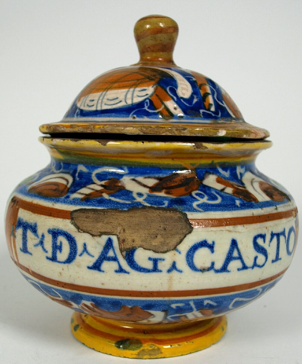 A late 16th century Pesaro or Castel Durante maiolica covered drug pot, circa 1575
