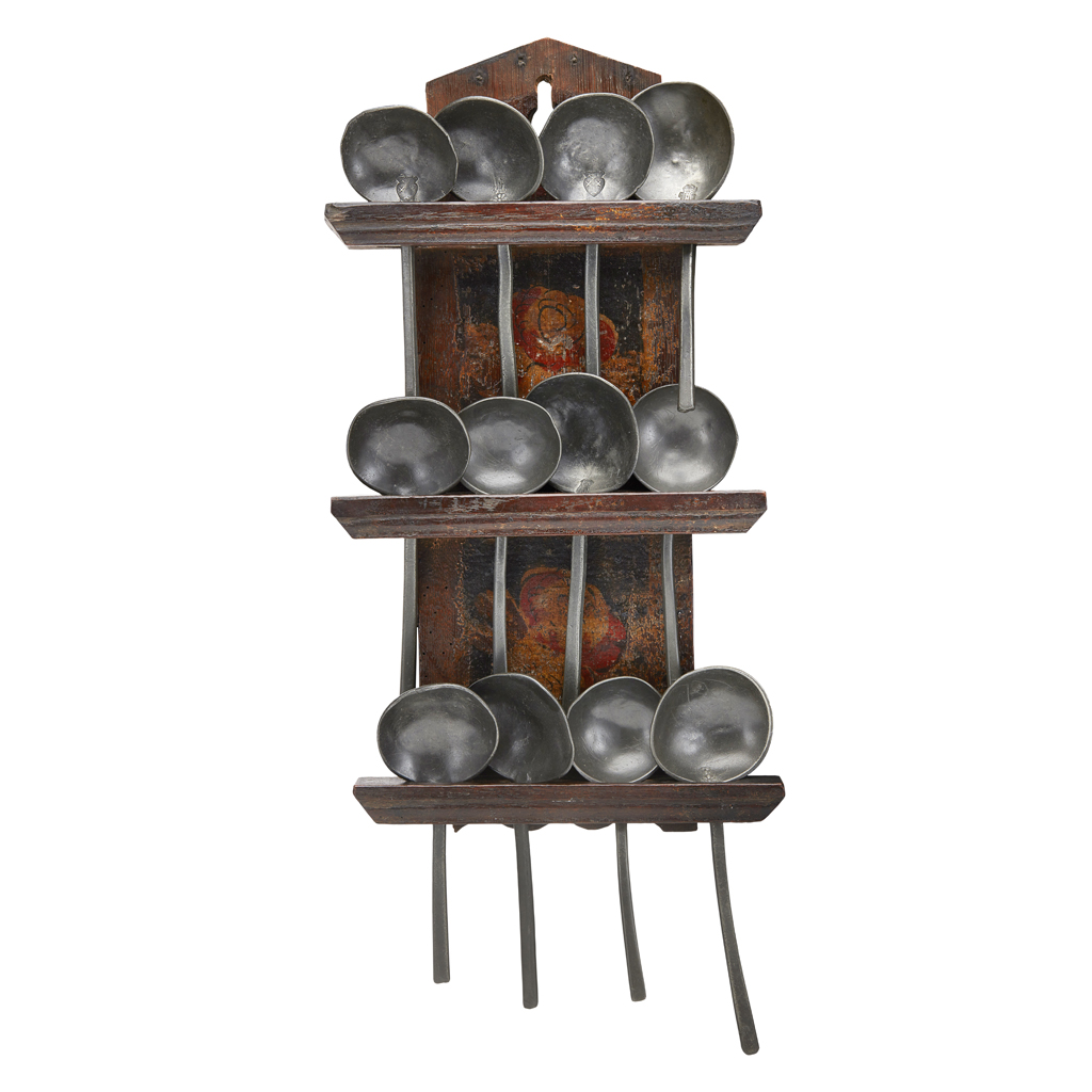 COLLECTION OF TWELVE PEWTER SPOONS AND HANGING RACK