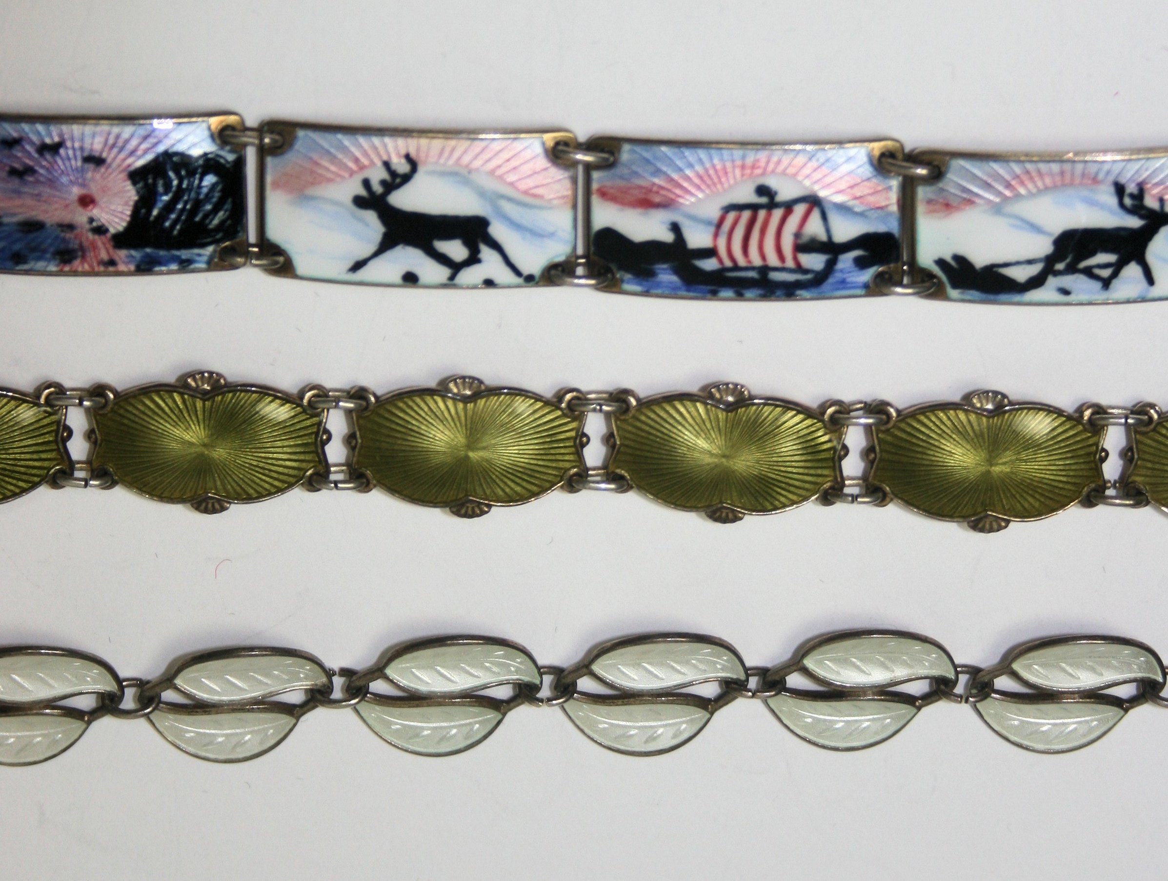 A collection of Scandinavian silver and enamelled jewellery