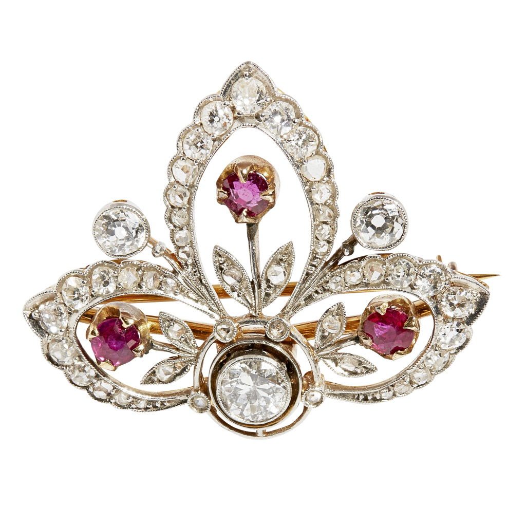 An mid-20th century ruby and diamond set brooch