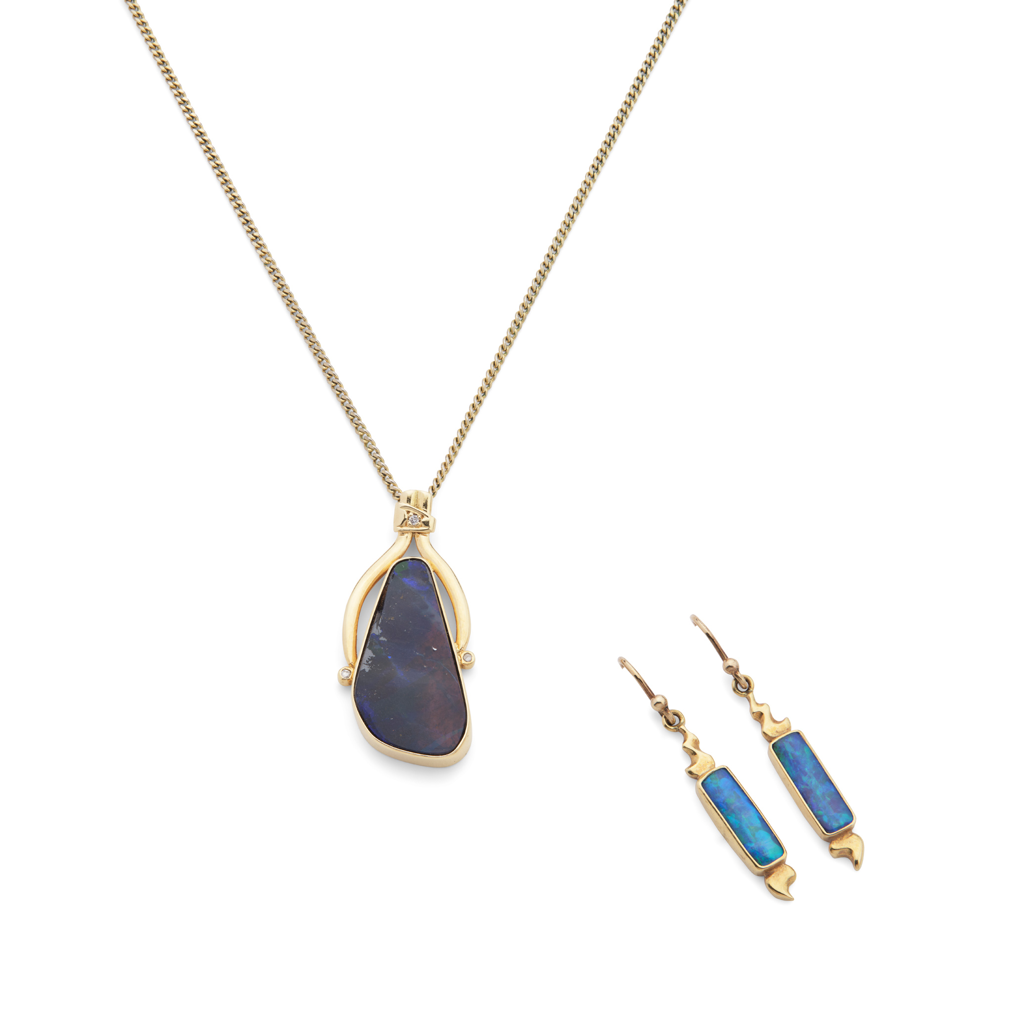 An opal pendant necklace and matching earrings