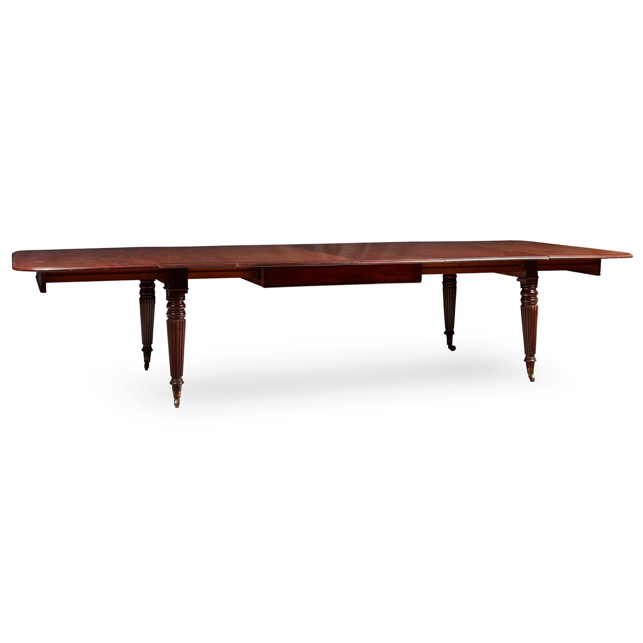 LATE REGENCY MAHOGANY DINING TABLE, IN THE MANNER OF GILLOWS
