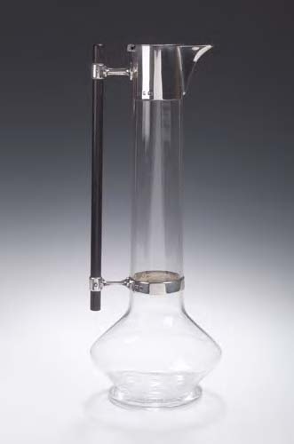 Christopher Dresser (1834-1904) A tall glass and silver mounted decanter,
