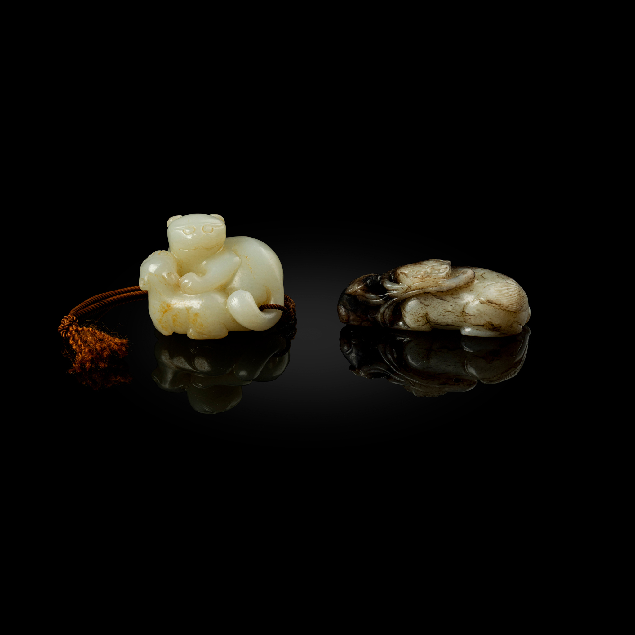 TWO CHINESE WHITE JADE 'DOUBLE CATS' CARVINGS
