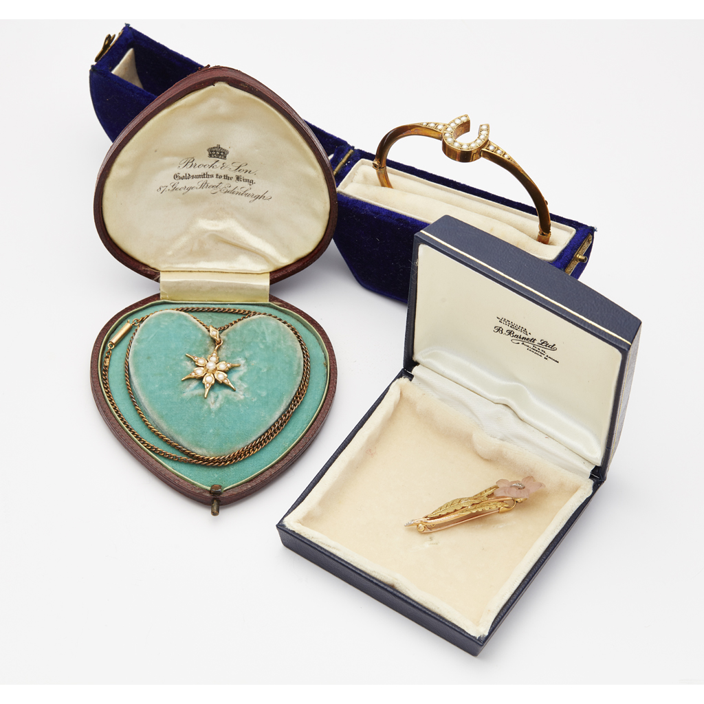 A gem set floral brooch