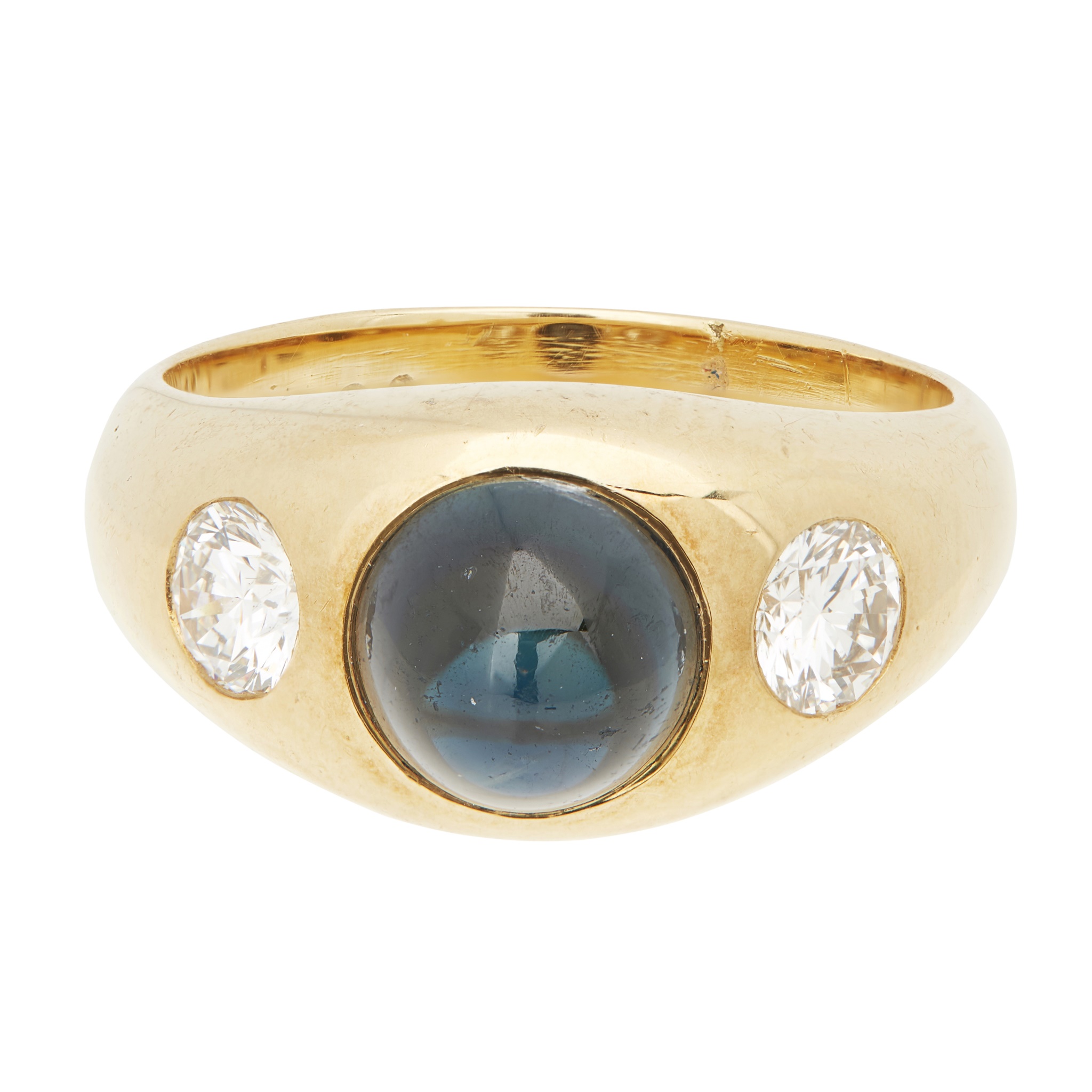 A sapphire and diamond three stone ring