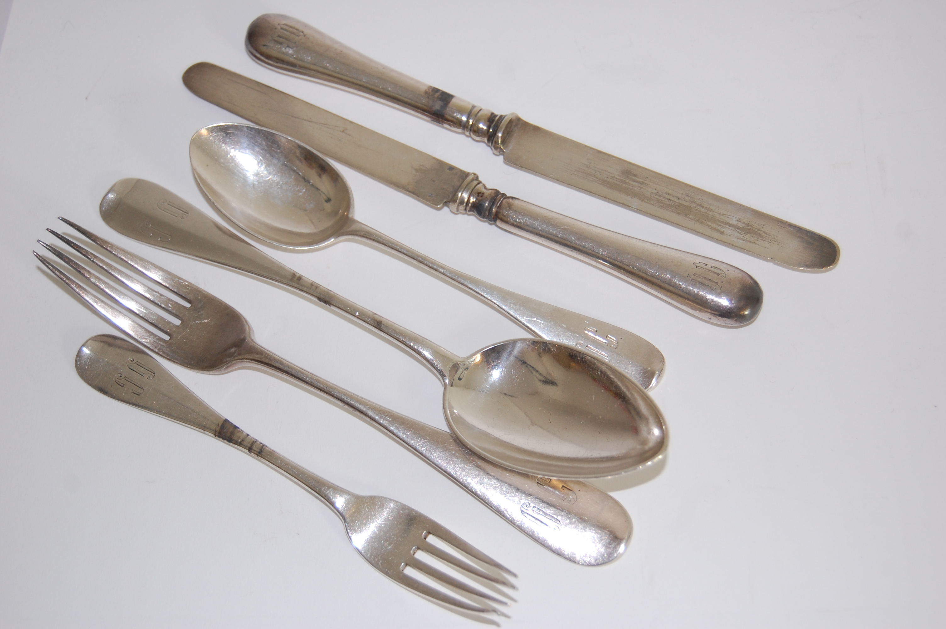 A late 19th Century Russian part canteen of cutlery