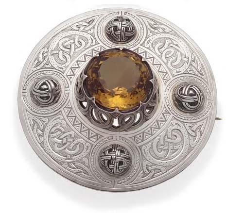 A Scottish silver mounted plaid brooch,