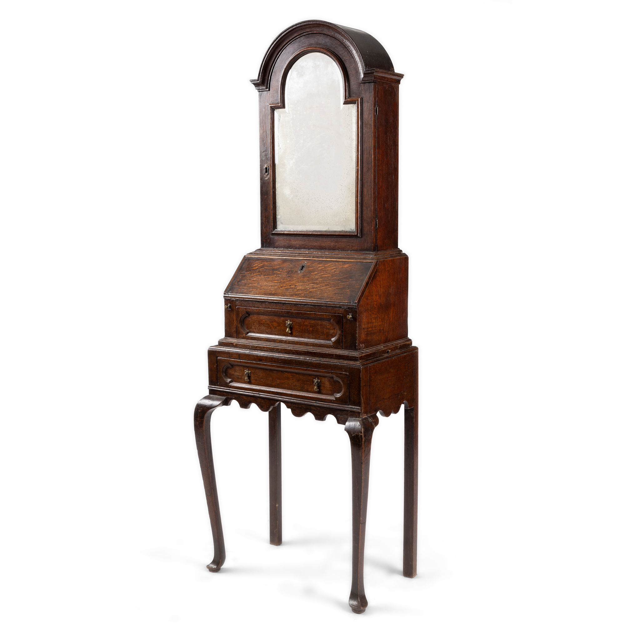 AN OAK BUREAU CABINET OF SMALL PROPORTIONS