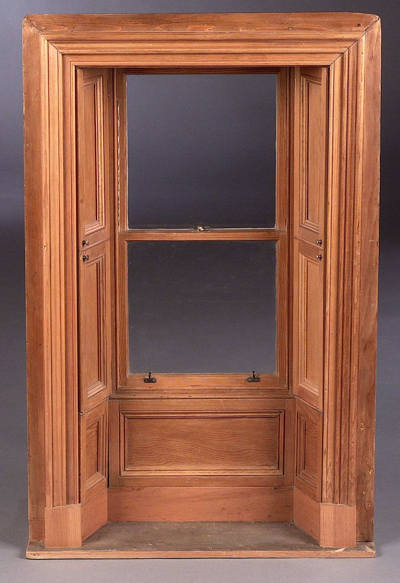 A late 19th century half scale pine model of a working sash and cash window