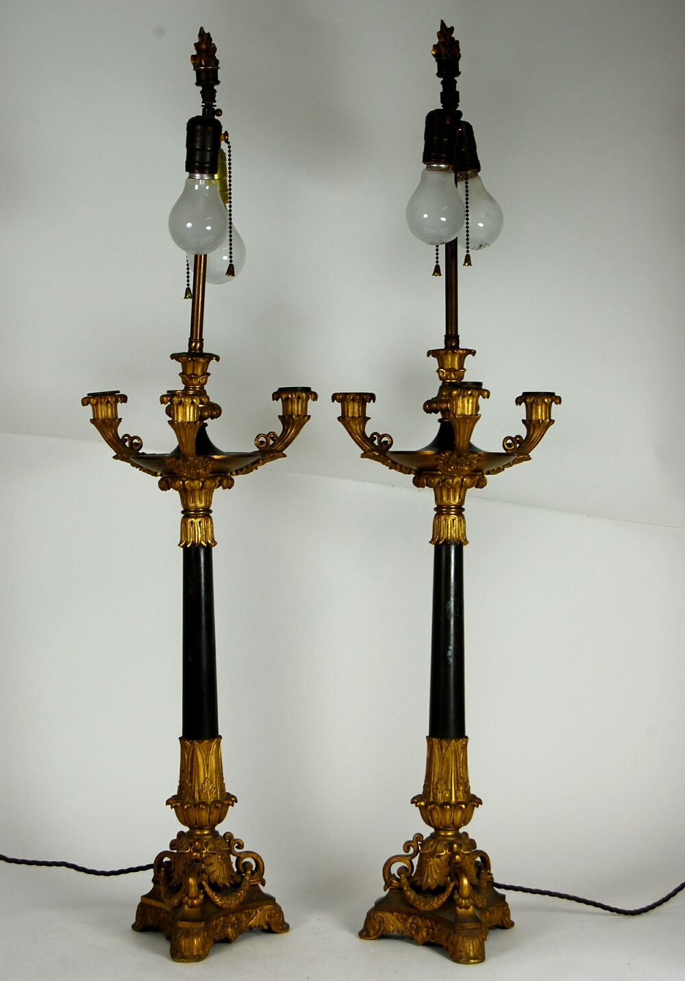 PAIR OF FRENCH GILT AND PATINATED BRONZE CANDELABRA