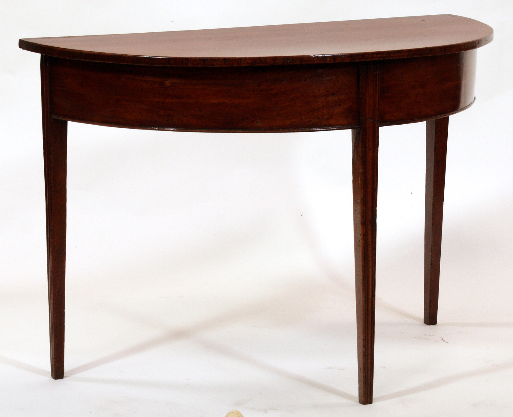 A George III mahogany demi lune table