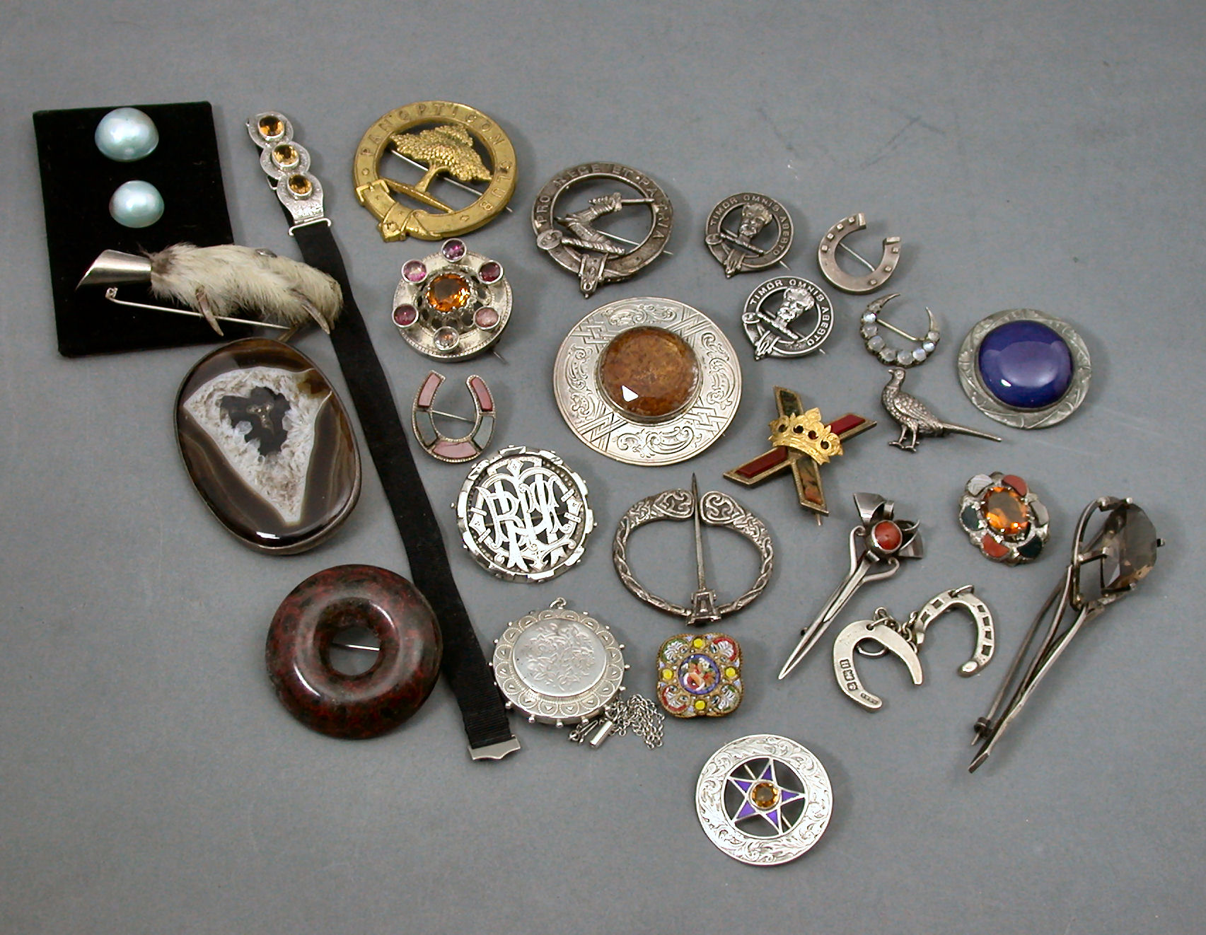 A St Andrew's cross form Scottish pebble brooch,