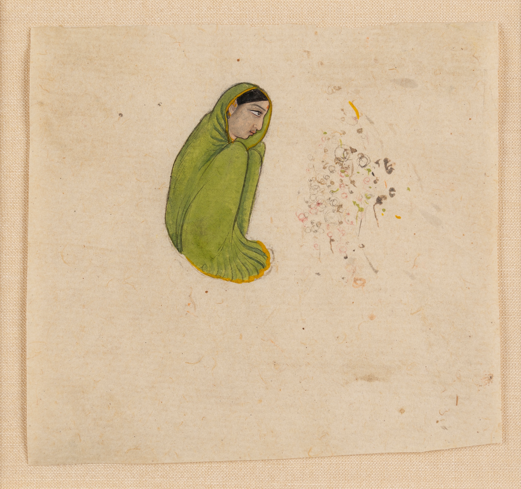 YOUNG WOMAN IN A GREEN SARI