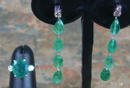An emerald and diamond set ring and pendant earrings,