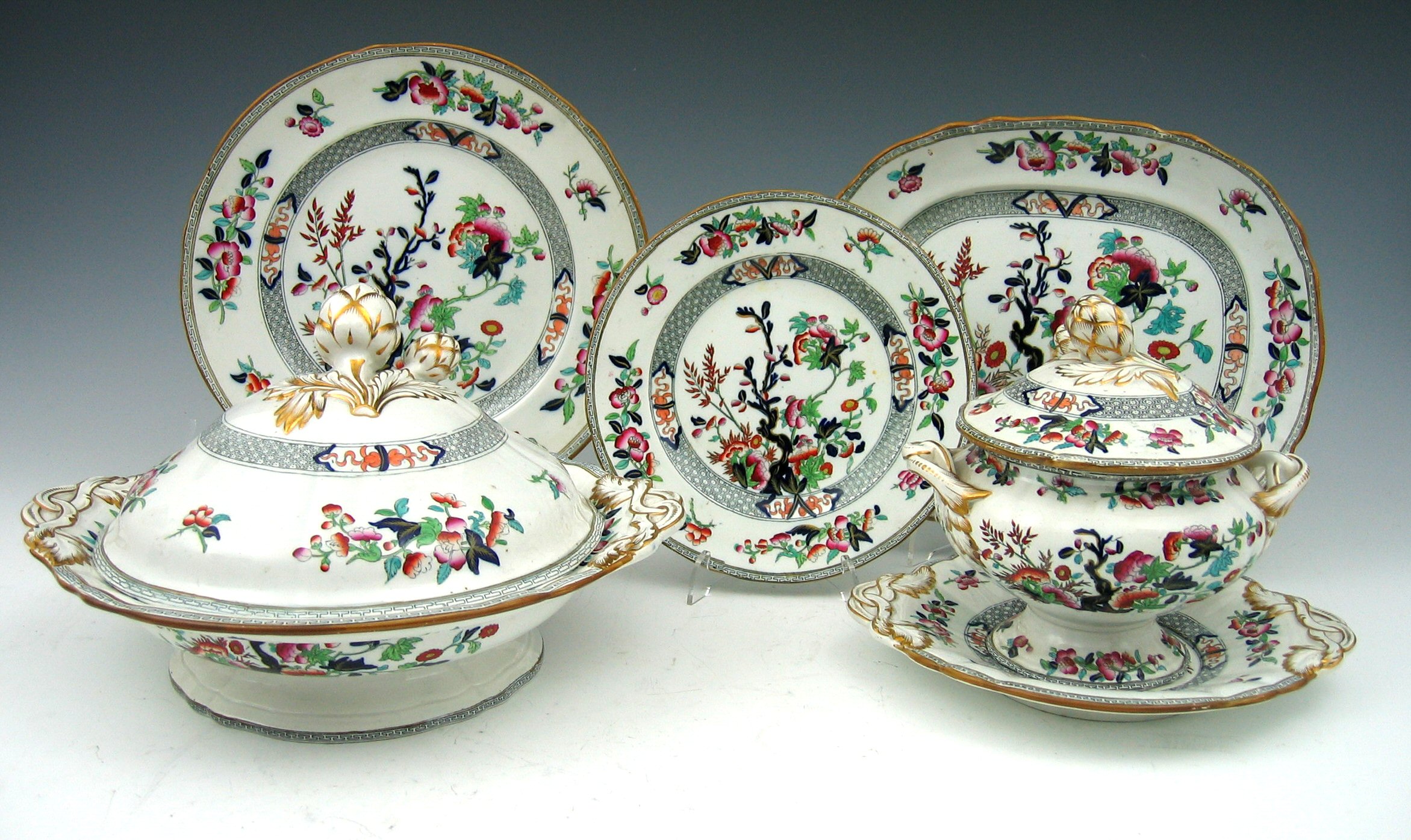 A 19th century large Imari palette ironstone dinner service,