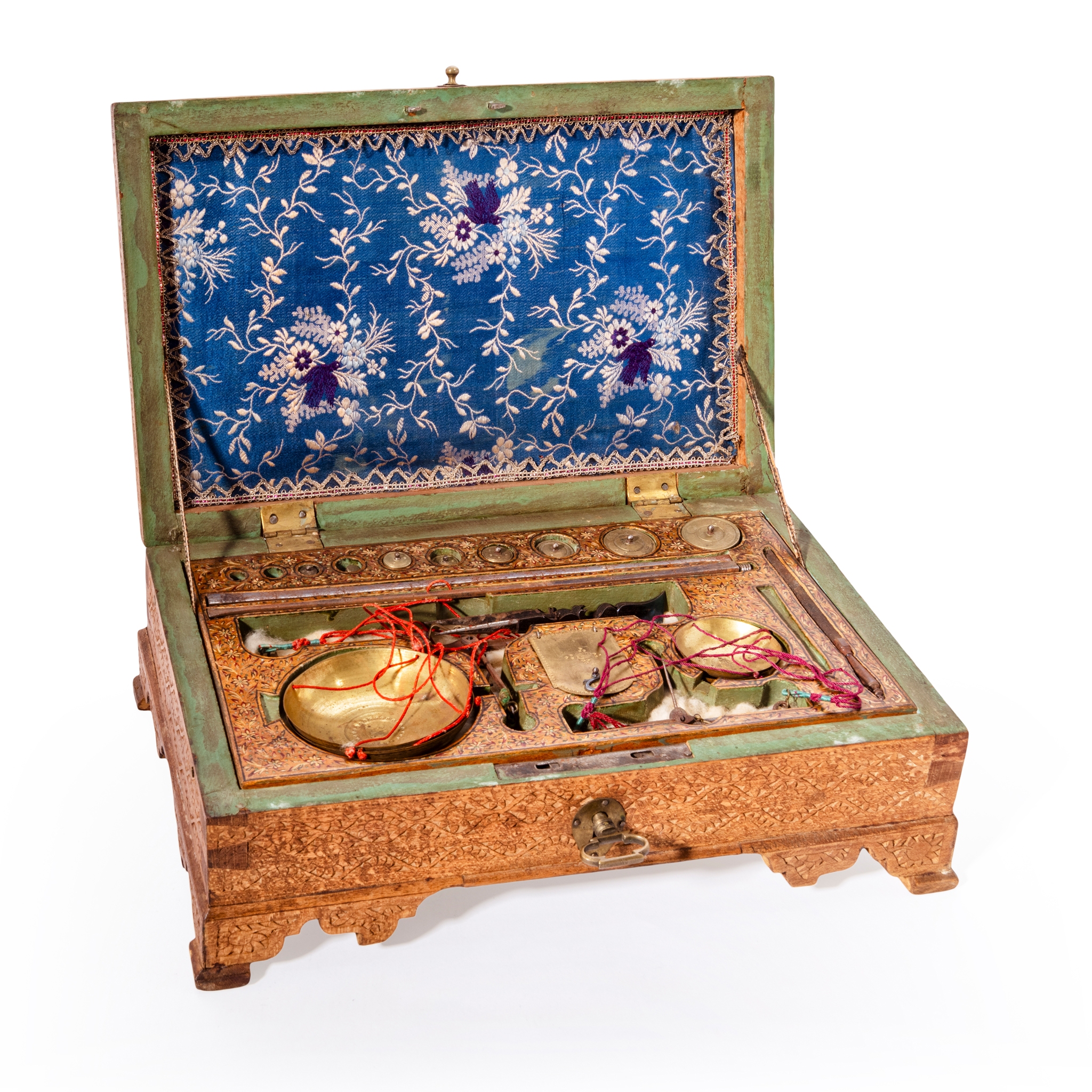 A QAJAR ENCASED MERCHANT'S SET OF WEIGHTS AND SCALES