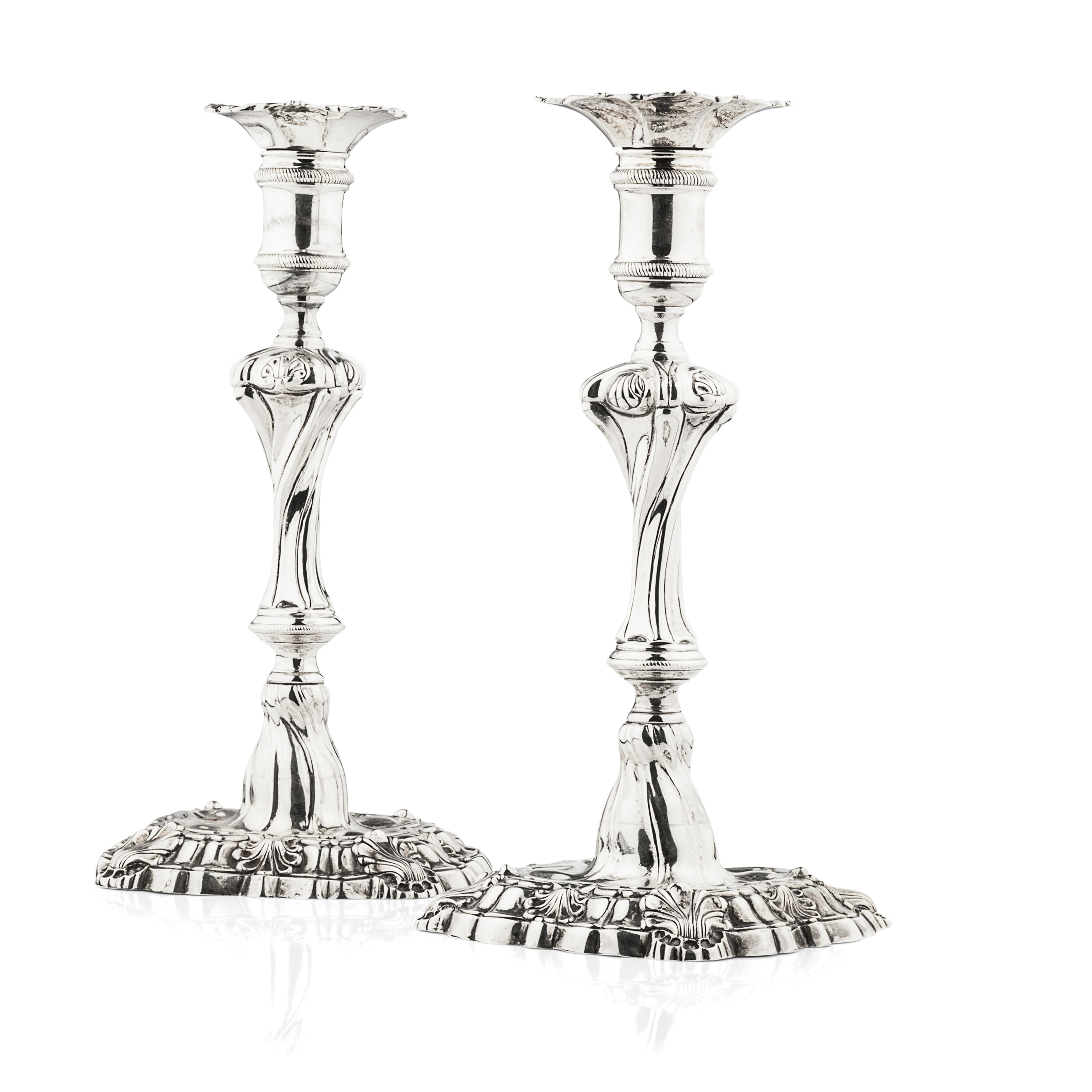 A pair of late Victorian candlesticks