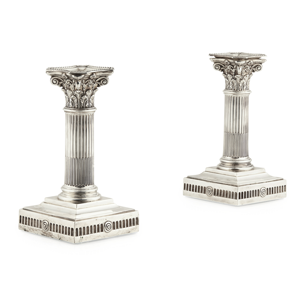 A pair of Victorian Corinthian column candlesticks