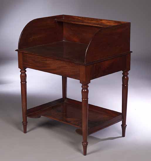 An early 19th century mahogany washstand