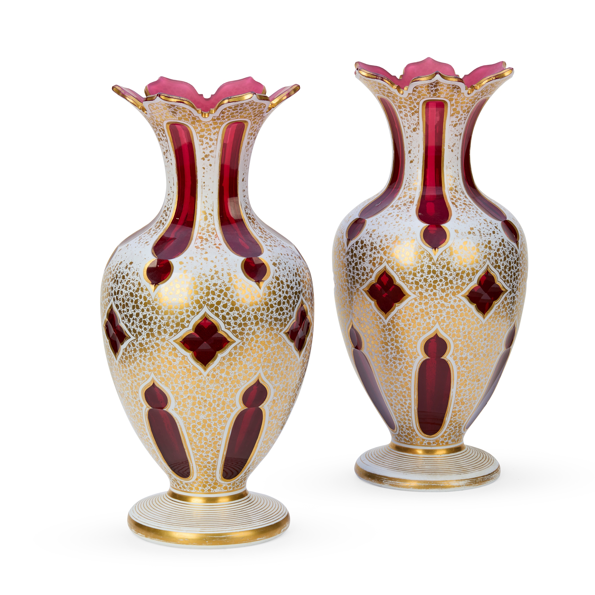 A PAIR OF BOHEMIAN WHITE OVER RED AND GILT GLASS VASES
