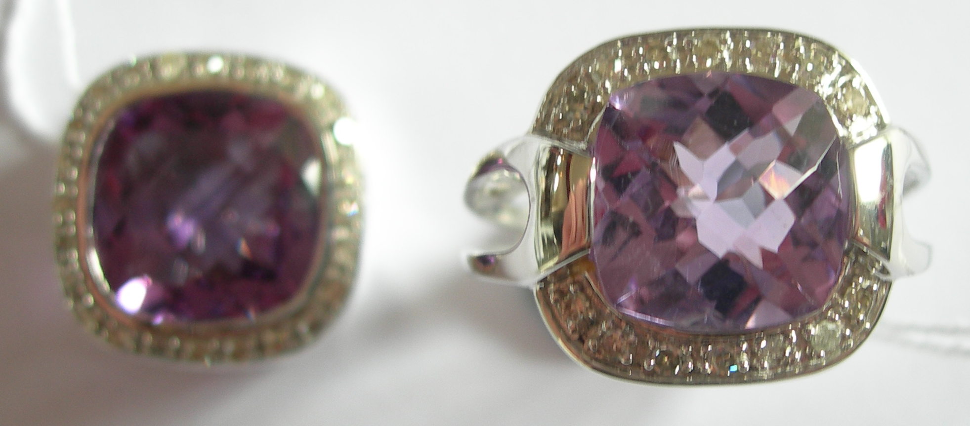 An amethyst and diamond set ring and matching pendant,
