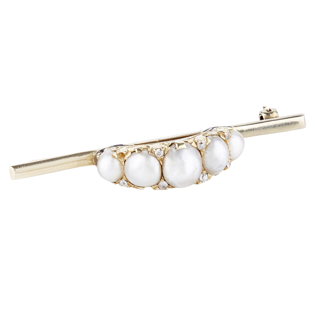 A pearl and diamond set brooch