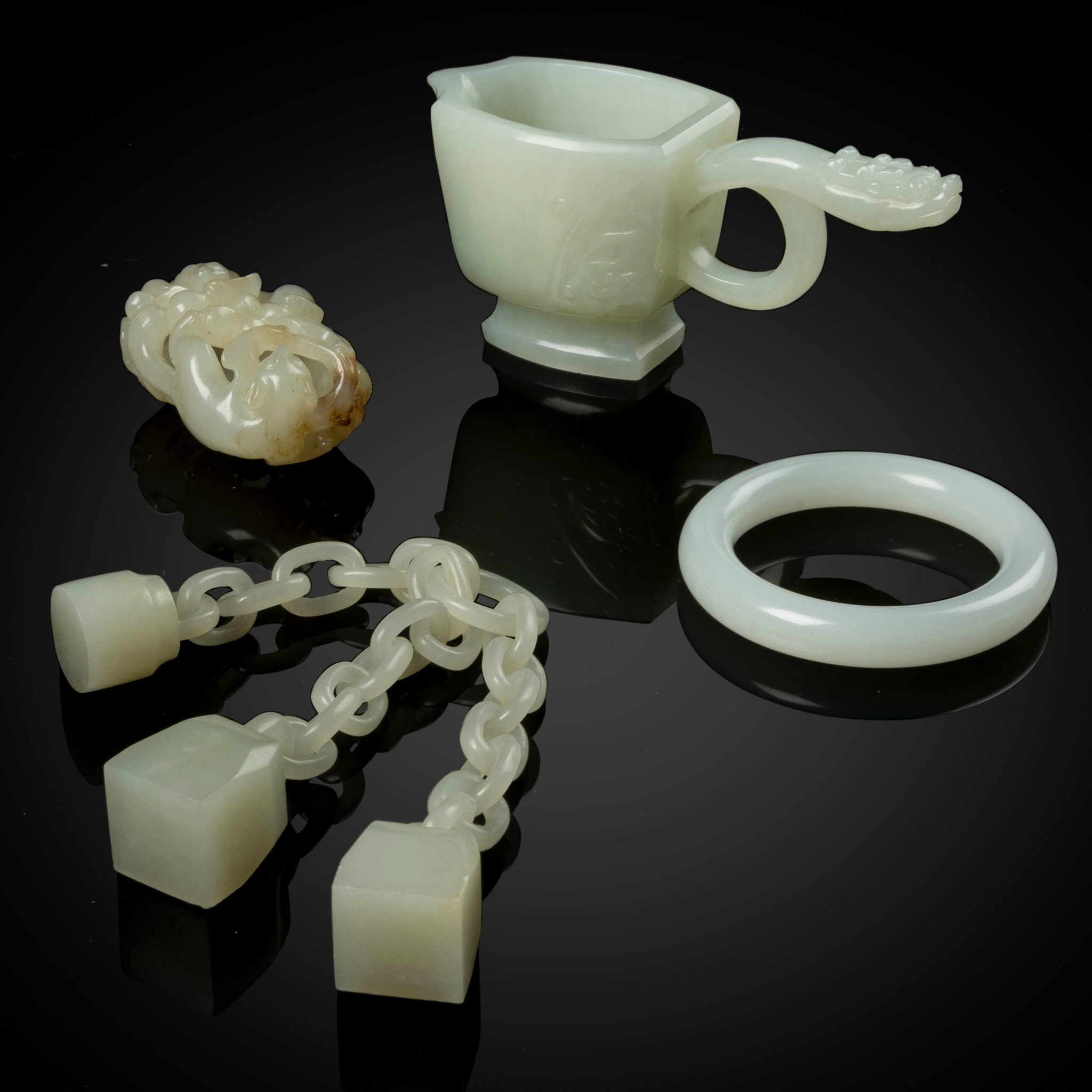 GROUP OF FOUR CHINESE WHITE JADE ITEMS