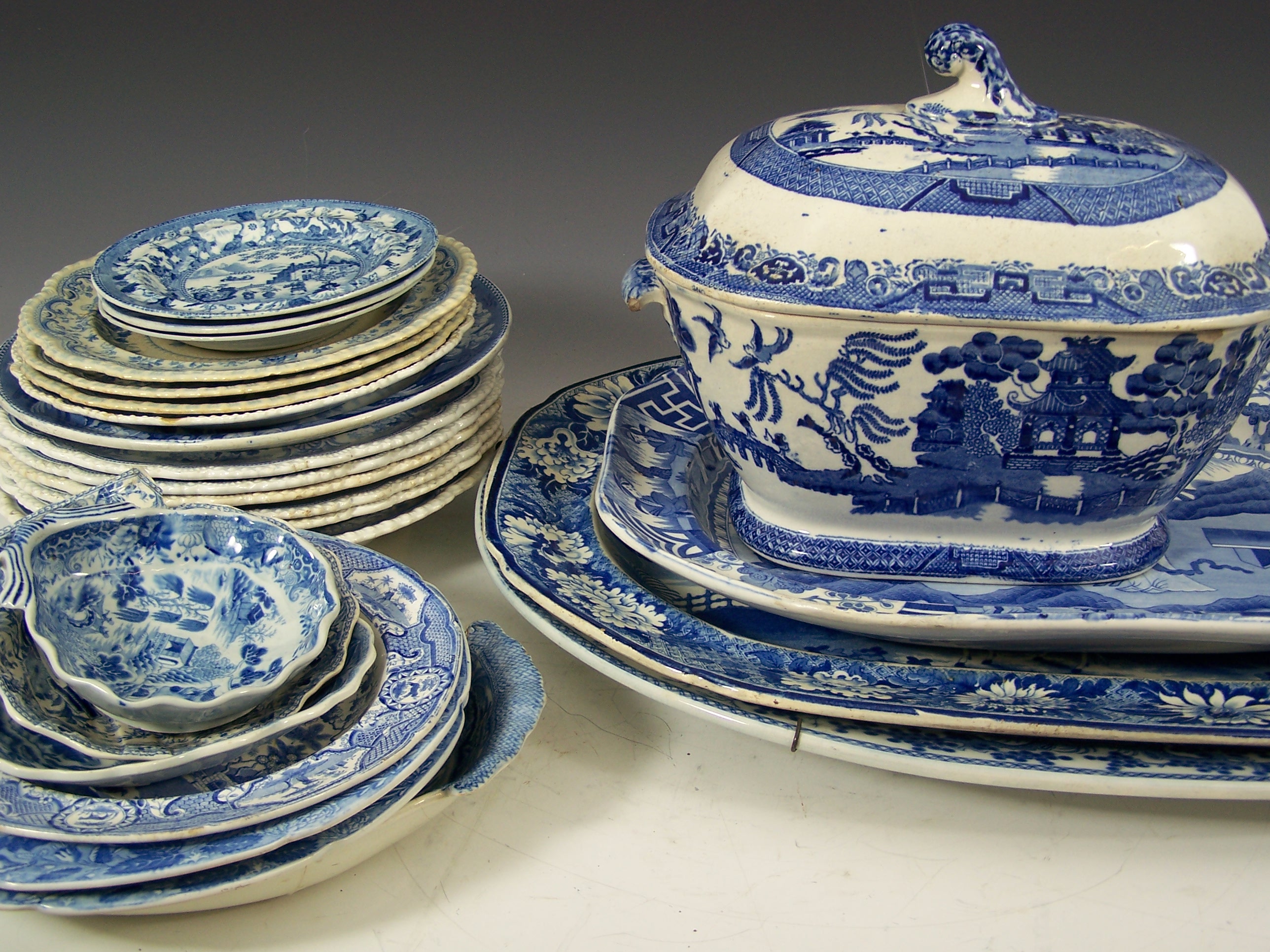 A large 19th century blue printed ashet,