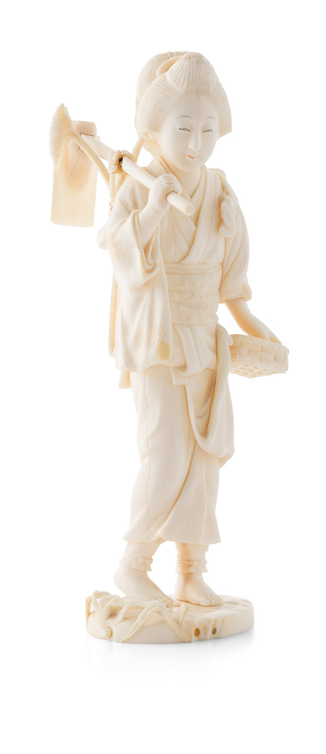JAPANESE IVORY OKIMONO OF A FEMALE GARDENER