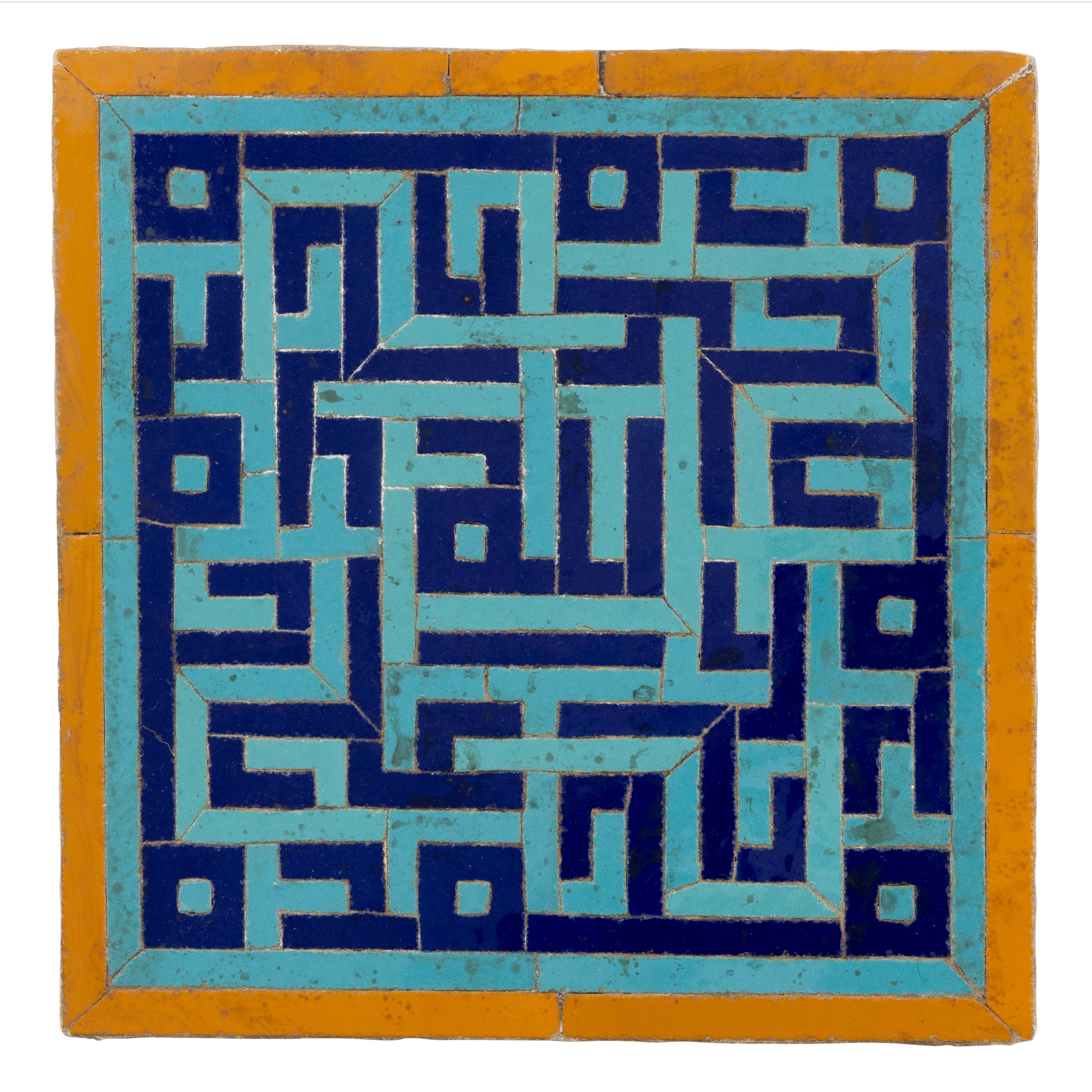 A RARE TIMURID OR EARLY SAFAVID CUERDA SECA POTTERY KUFIC TILE