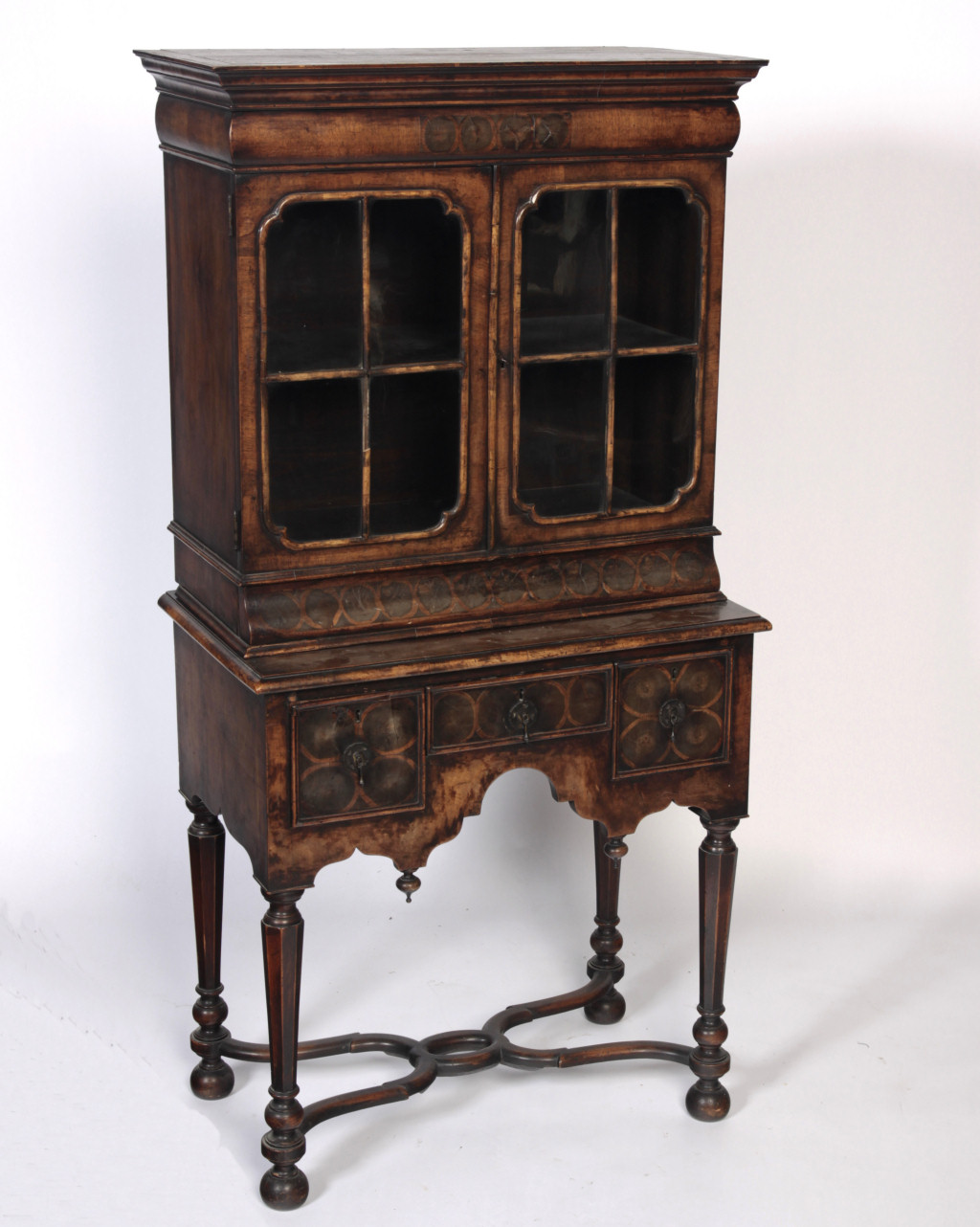 WILLIAM AND MARY STYLE WALNUT AND OYSTER VENEER CABINET ON STAND
