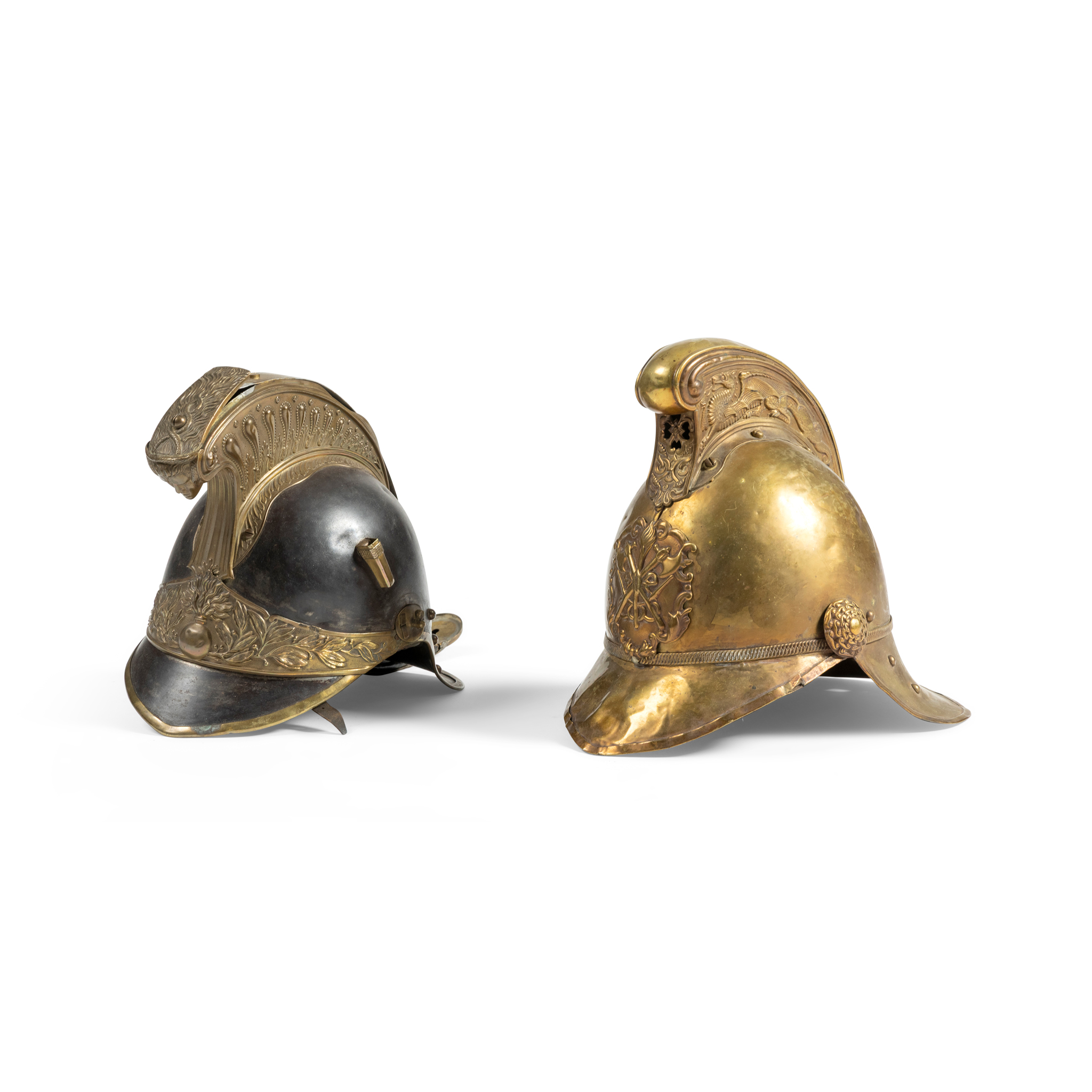 A FRENCH CUIRASSIER'S HELMET, AND A FIREMAN'S HELMET OF MERRYWEATHER PATTERN