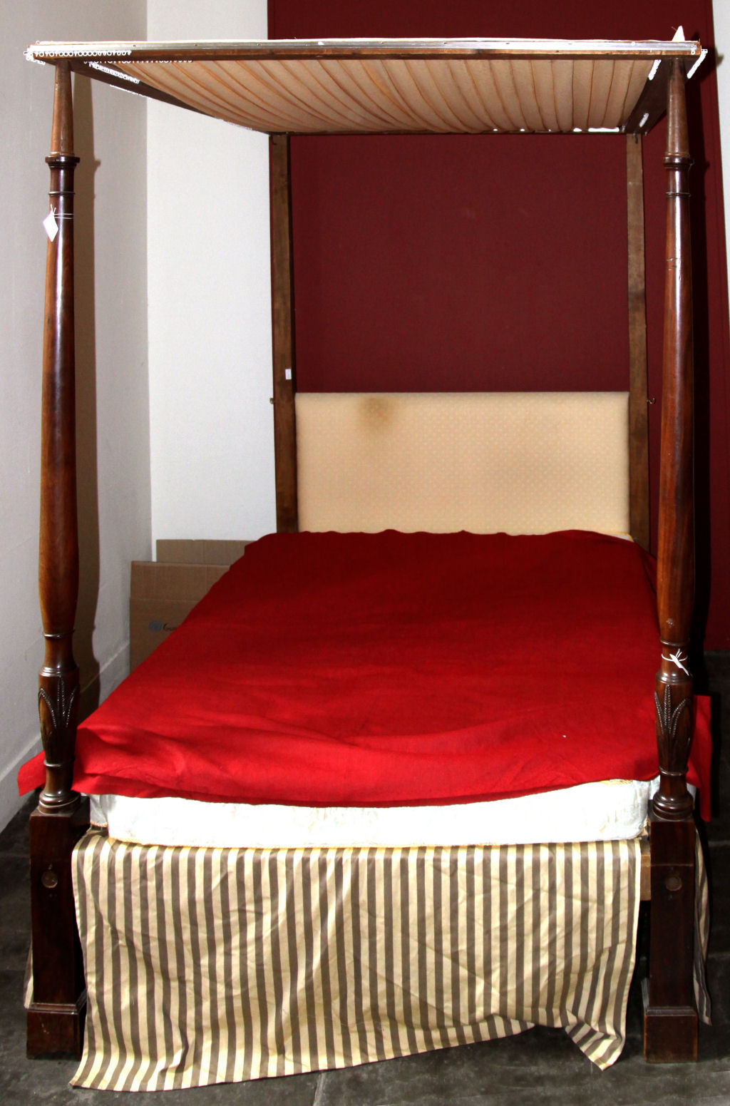 A mahogany four poster bed