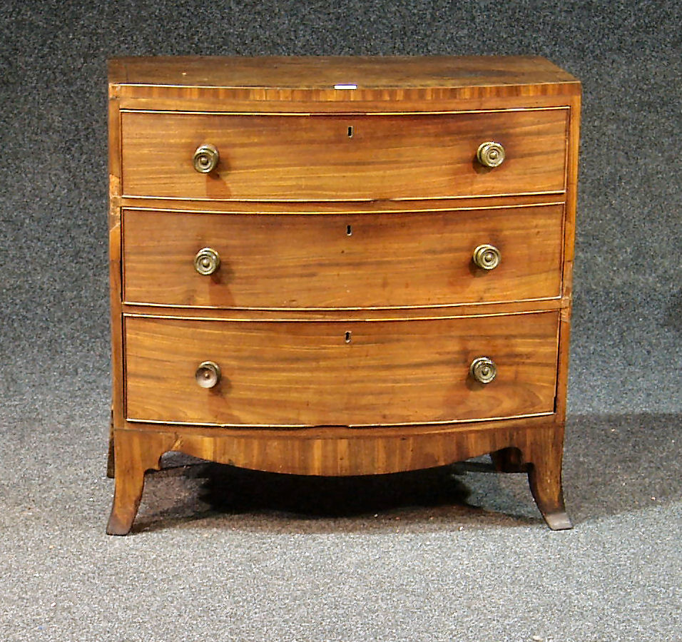 A Georgian style mahogany bowfront chest,