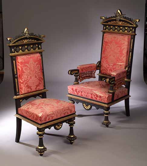 A set of twelve 19th century ebonised and gilt dining chairs