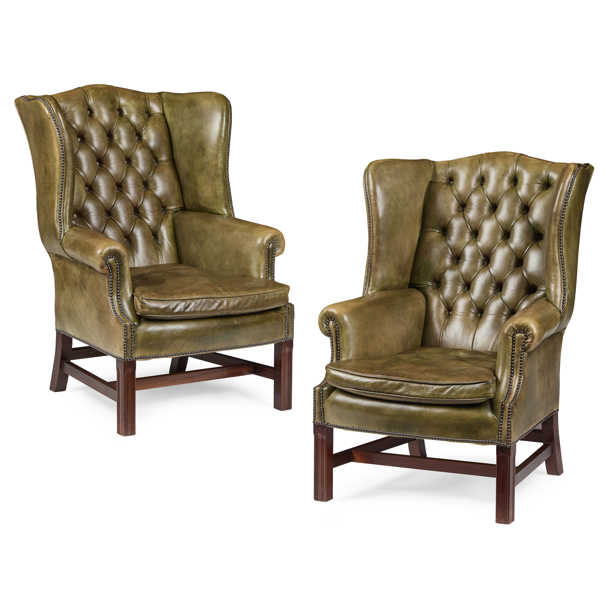 PAIR OF GEORGIAN STYLE GREEN LEATHER WING ARMCHAIRS