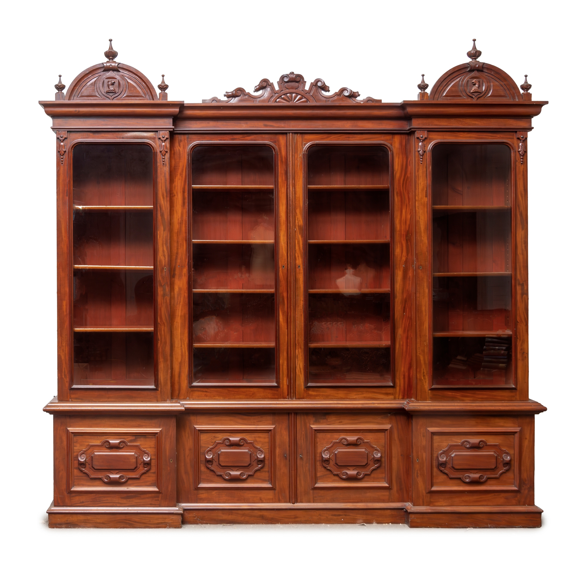 A VICTORIAN MAHOGANY INVERTED BREAKFRONT LIBRARY BOOKCASE