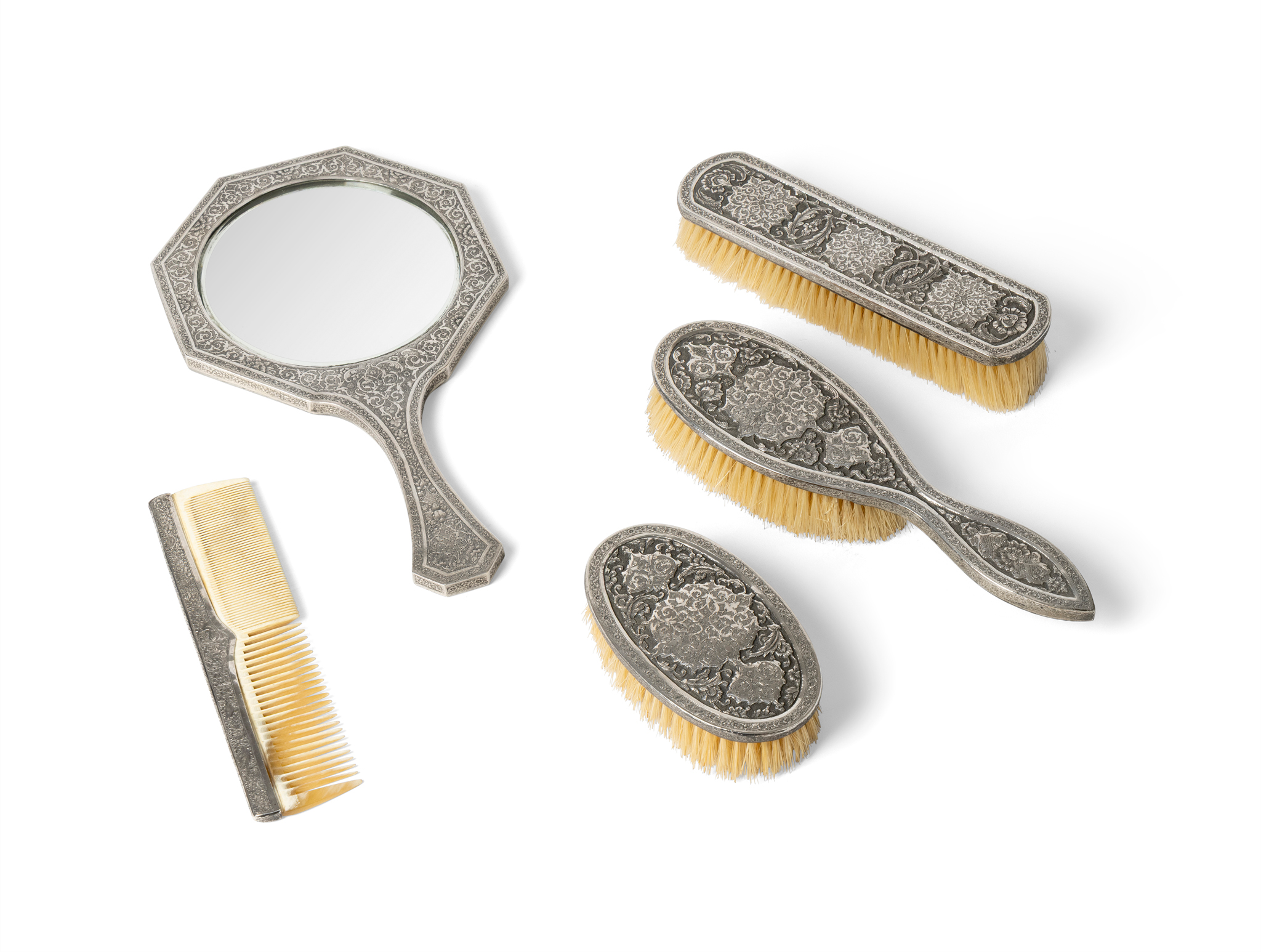 A QAJAR SILVER DRESSING TABLE SET