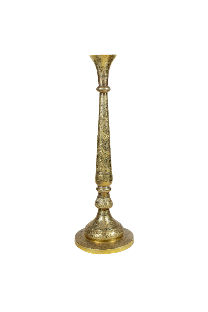 A Middle Eastern brass lamp