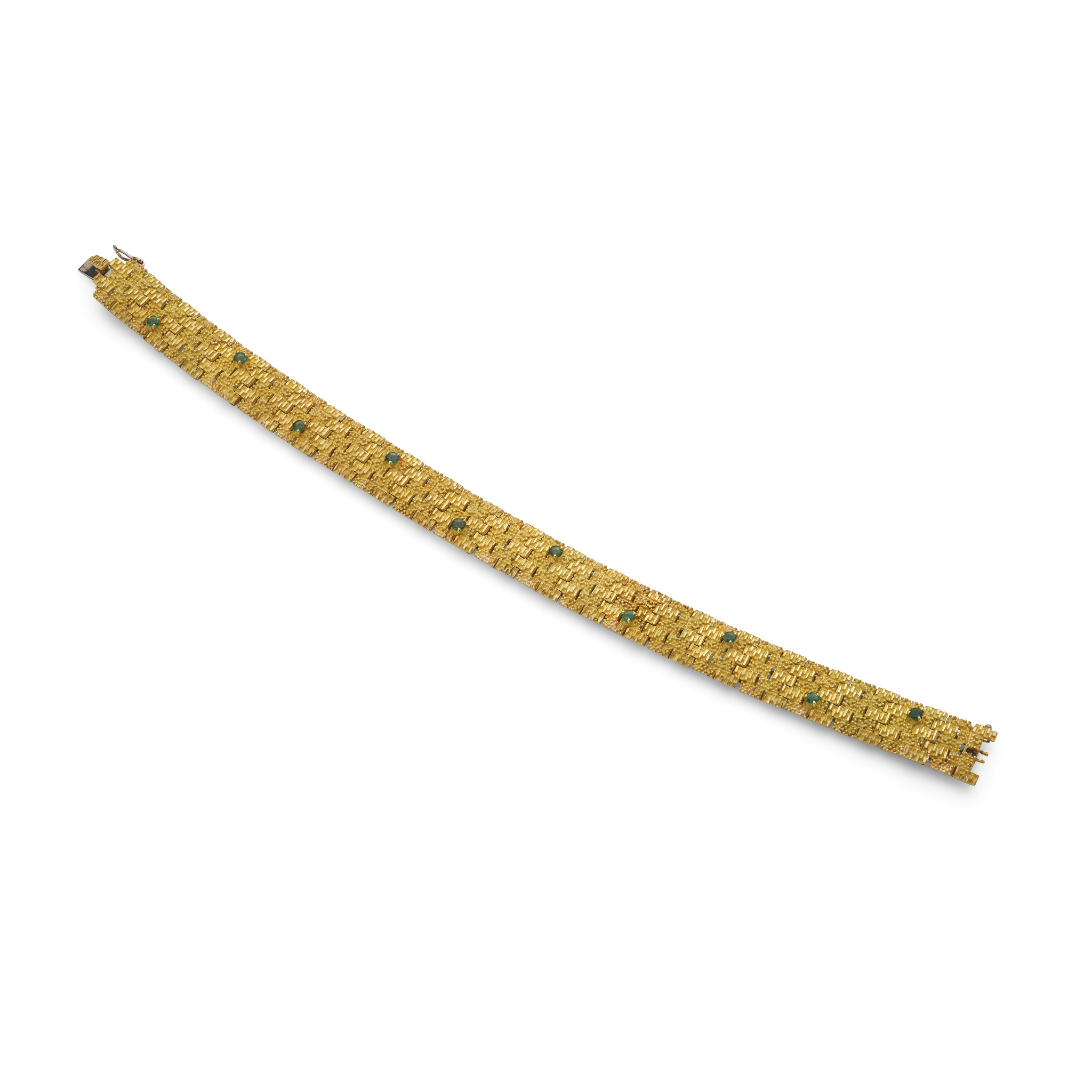 A gold and emerald bracelet, 1973