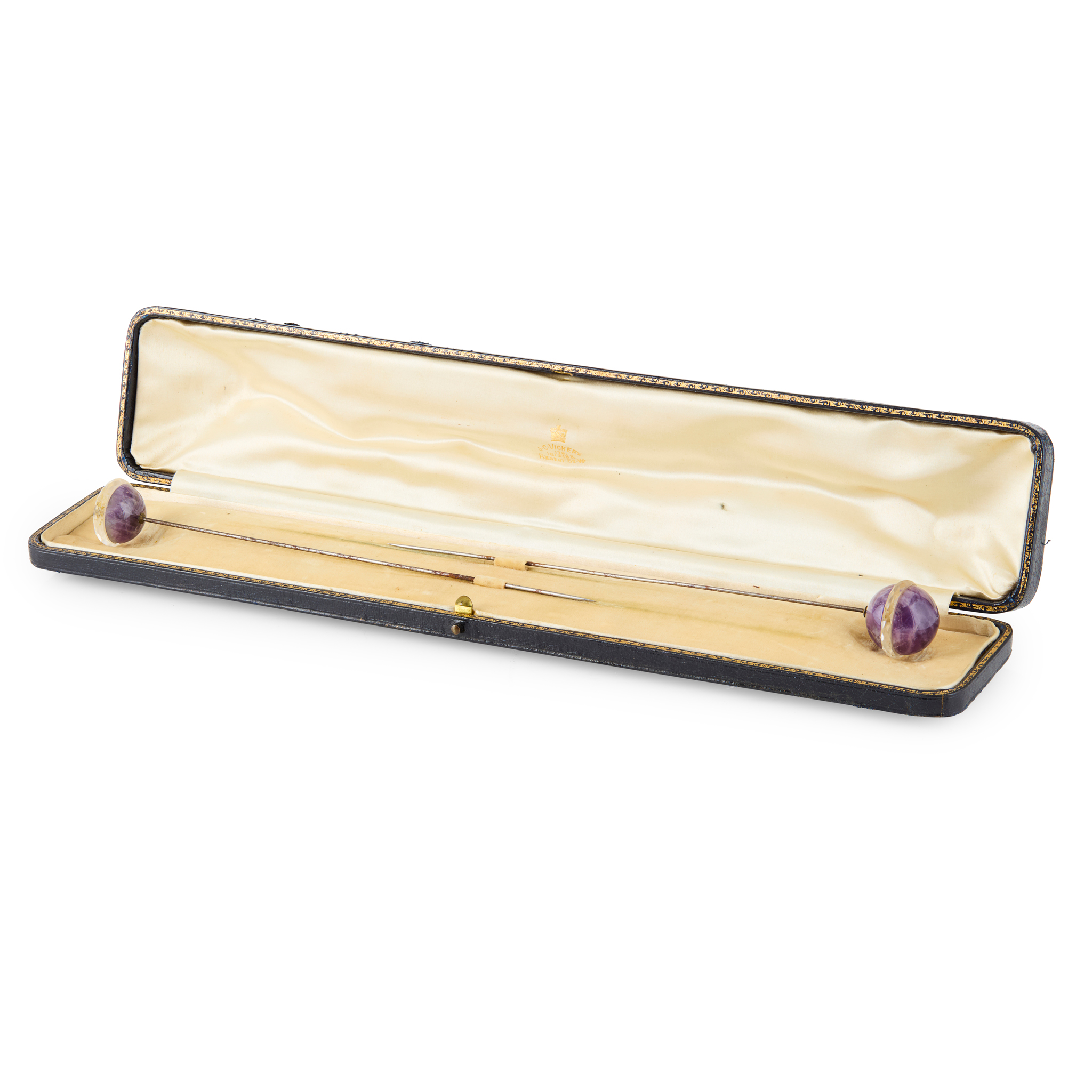 A CASED AMETHYST HAT PIN