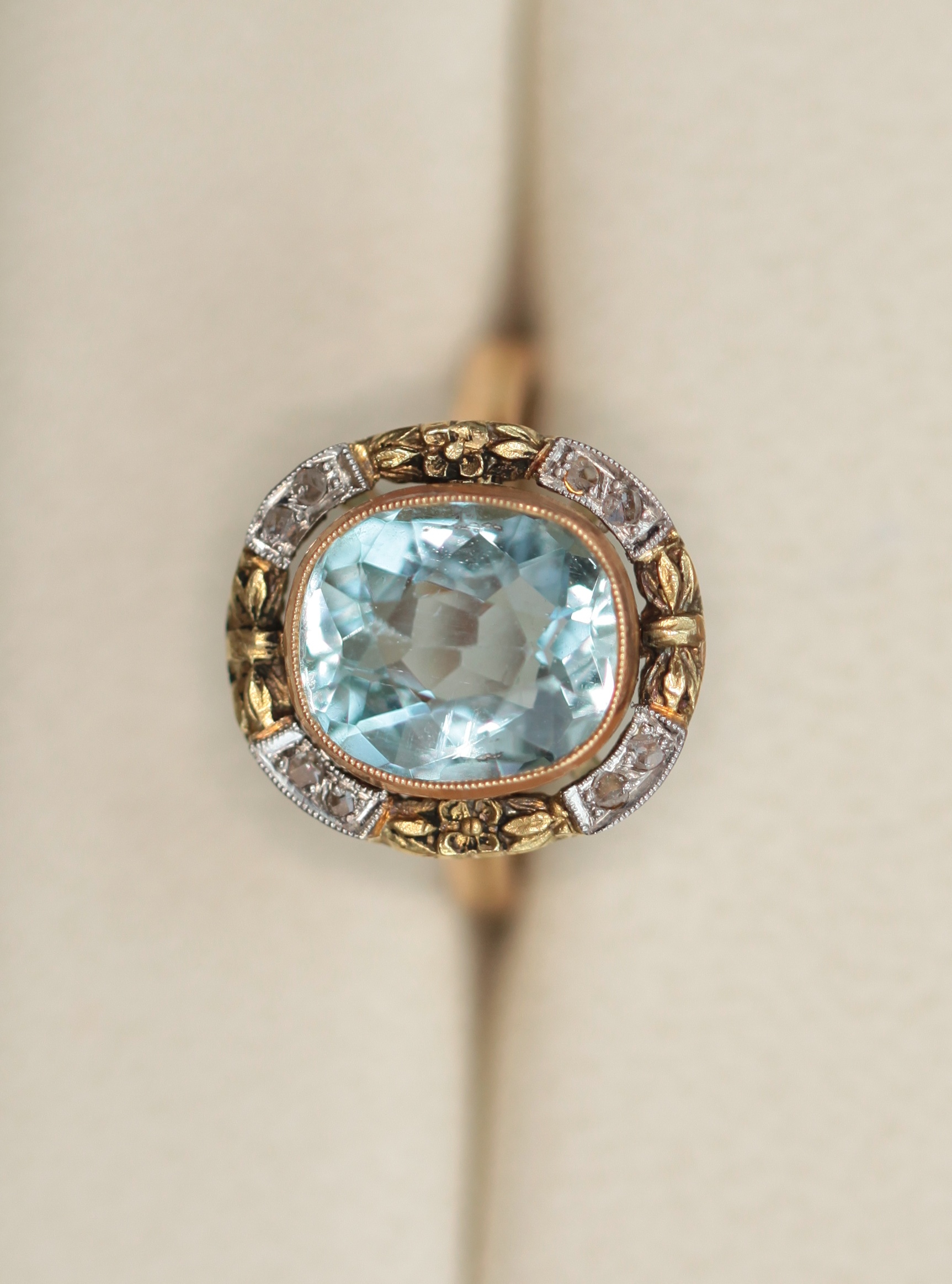 An early 20th century aquamarine and diamond set ring