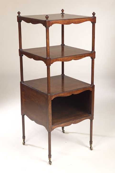 An early 19th century mahogany whatnot,