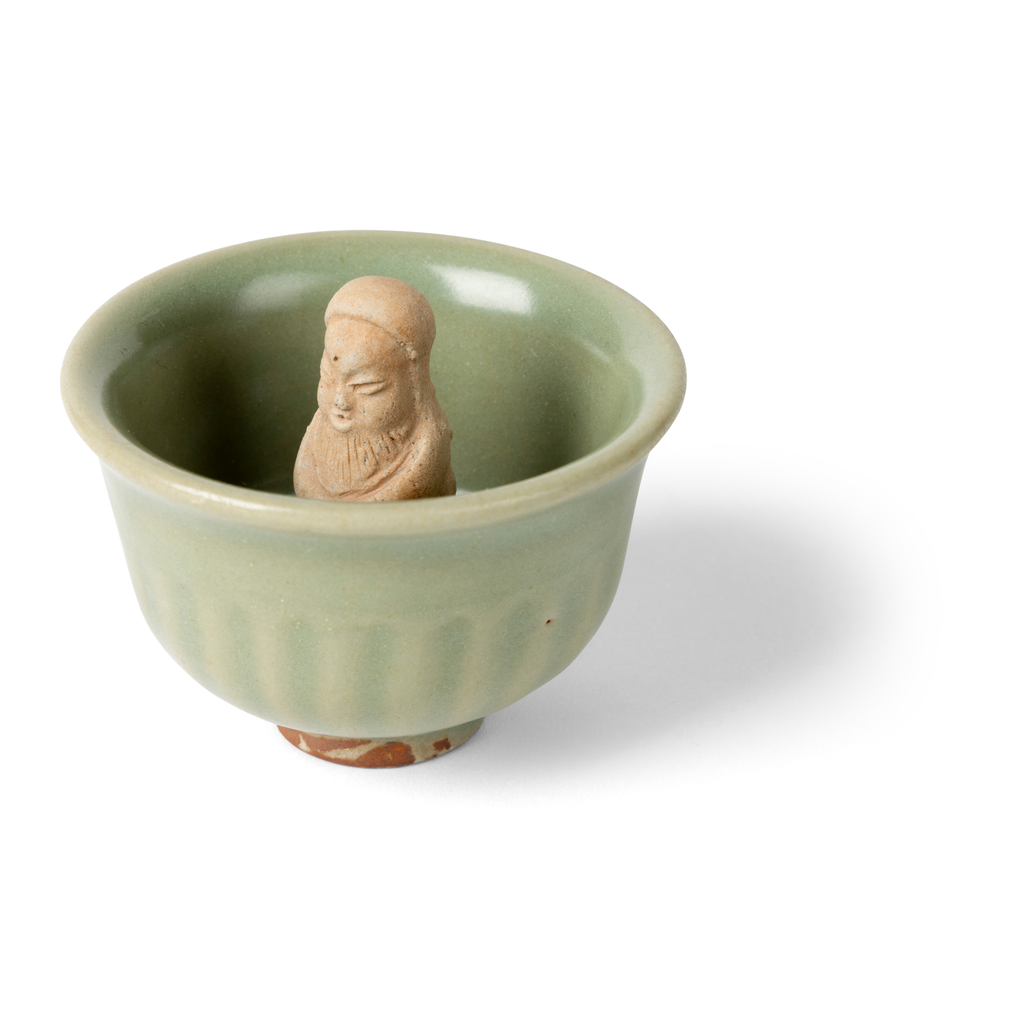 CHINESE LONGQUAN CELADON-GLAZED 'FIGURAL' SURPRISE CUP