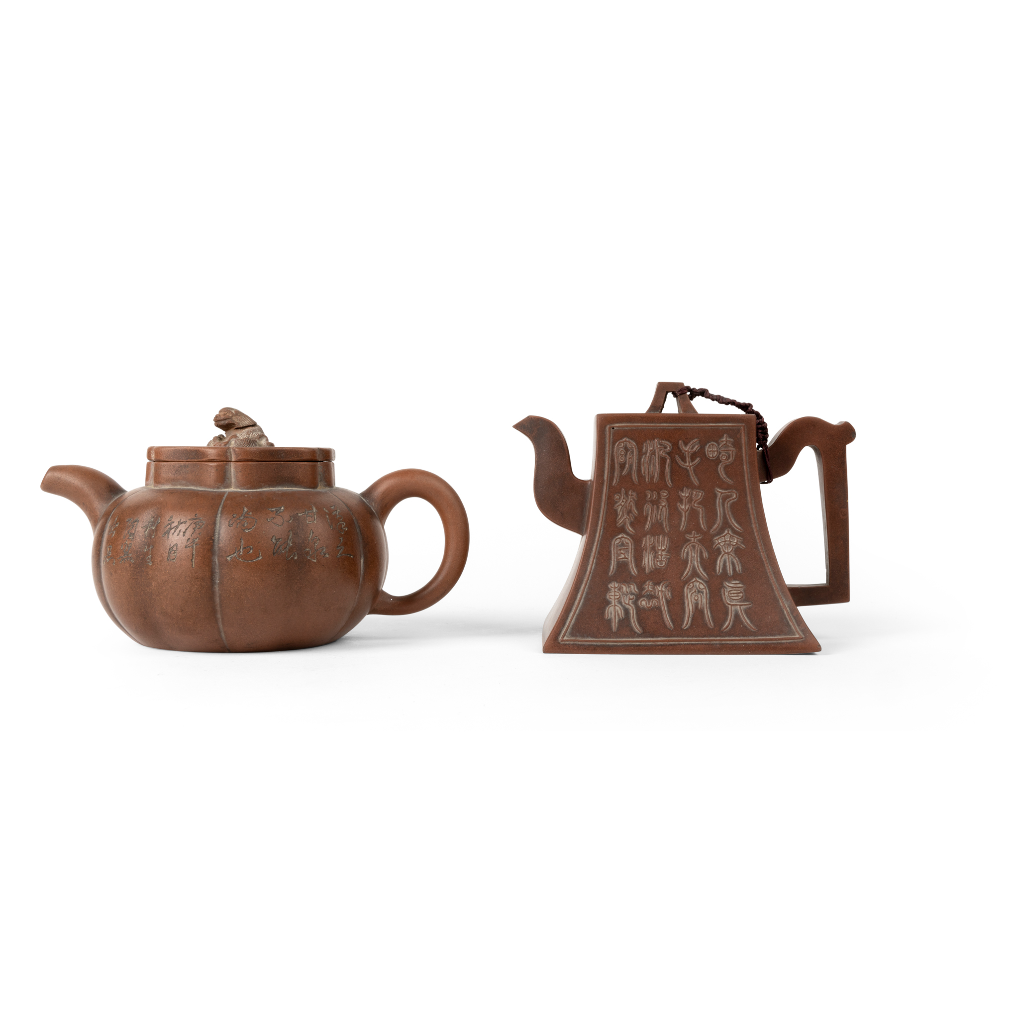 TWO YIXING STONEWARE TEAPOTS