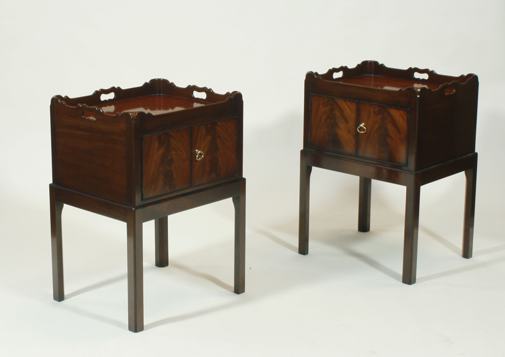 A pair of Georgian style mahogany bedside cabinets