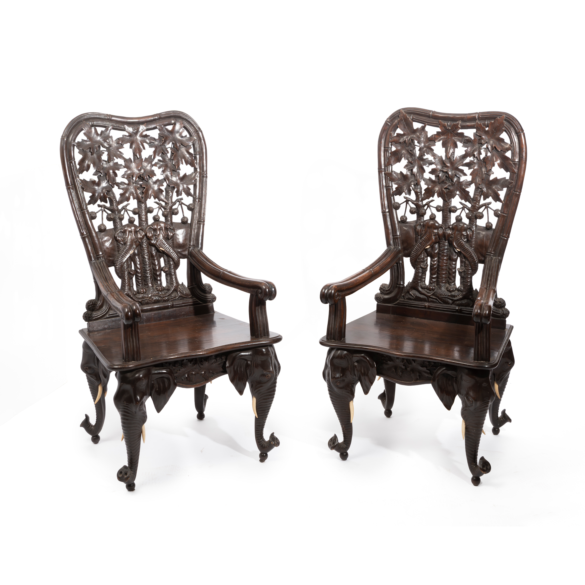 A SALON SUITE OF BLACK FOREST ELEPHANT FURNITURE BY PETER ABEGGLEN