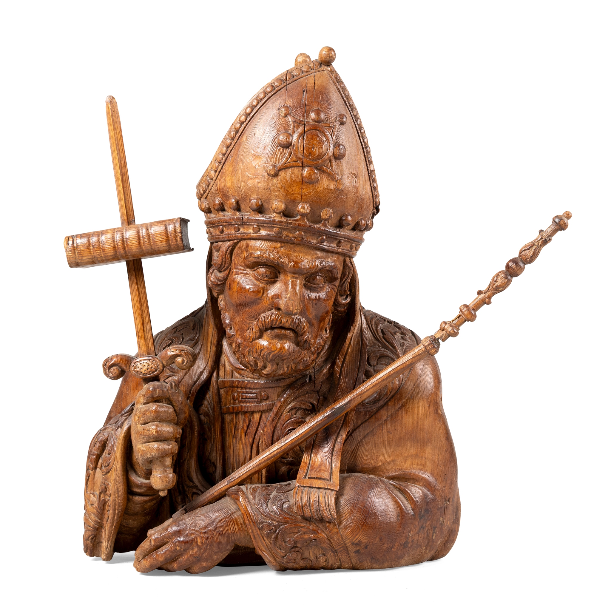 A CARVED PINE CONTINENTAL BUST OF A BISHOP SAINT